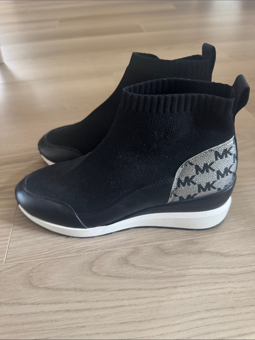 Michael Kors Black Knit Sock Booties with Silver MK Heel Panel